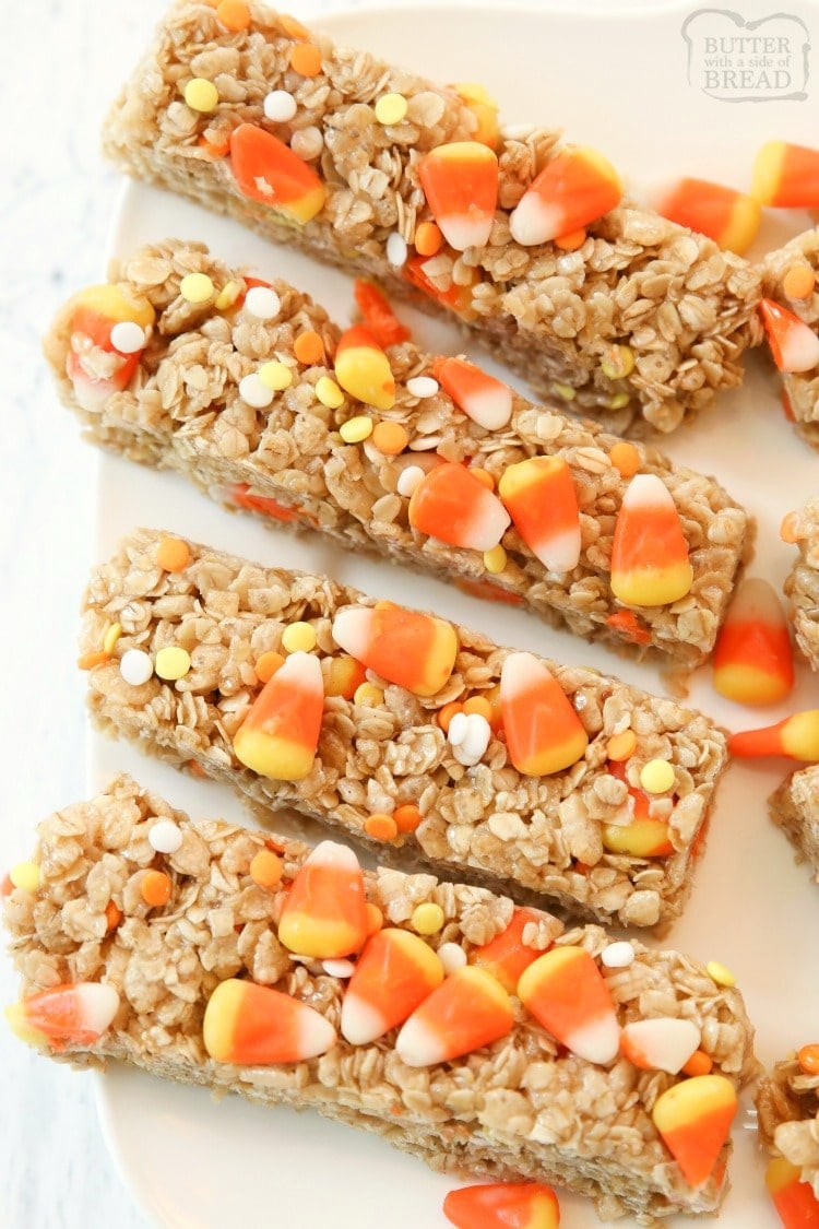 Quick & Easy Candy Corn Granola Bar recipe made in minutes. Perfect Halloween snack! Simple ingredients combined to make a tasty homemade granola bars. Fun halloween snacks made with candy corn!