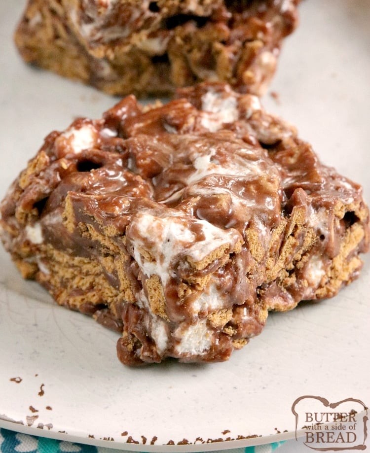 No Bake S'mores Bars are made with Golden Grahams, melted chocolate and marshmallows. This delicious no bake dessert recipe comes together in just a few minutes and tastes just like s'mores, without the mess or the campfire! 
