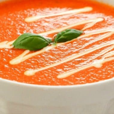 Easy 10-Minute Tomato Basil Soup recipe made with San Marzano style tomatoes, broth, fresh basil & butter. Smooth & tangy tomato soup that comes together fast.