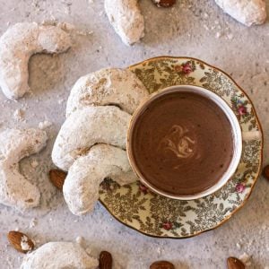 Almond cookies with a cup of hot chocolate