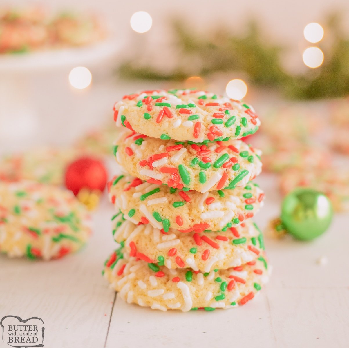stack of holiday cookies covered in sprinkles