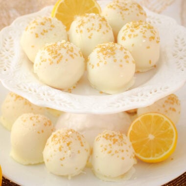 lemon cake bites on a white cake stand