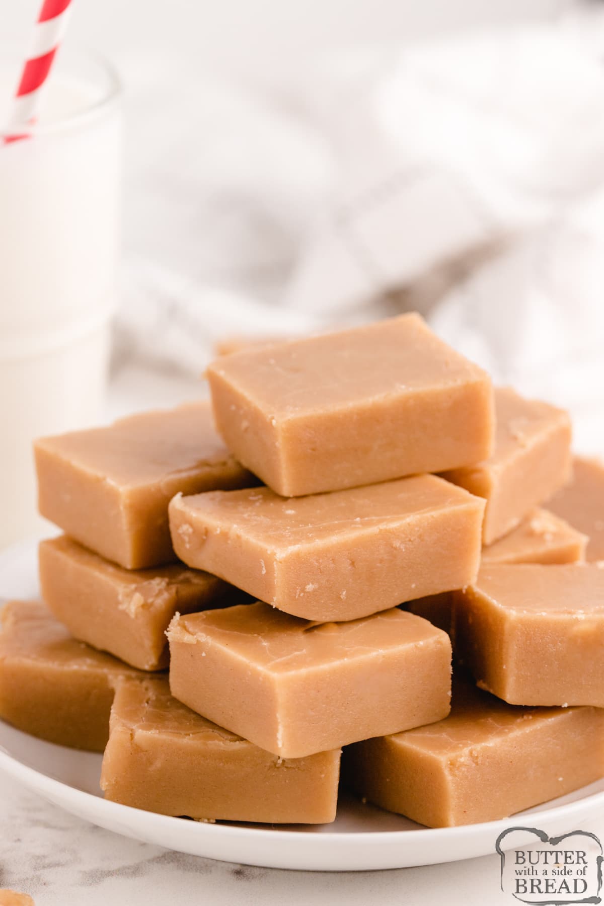 eanut Butter Fudge is easily made with only 4 ingredients, no candy thermometer needed! This easy fudge recipe is made with peanut butter, sugar, milk and vanilla extract- that's it!
