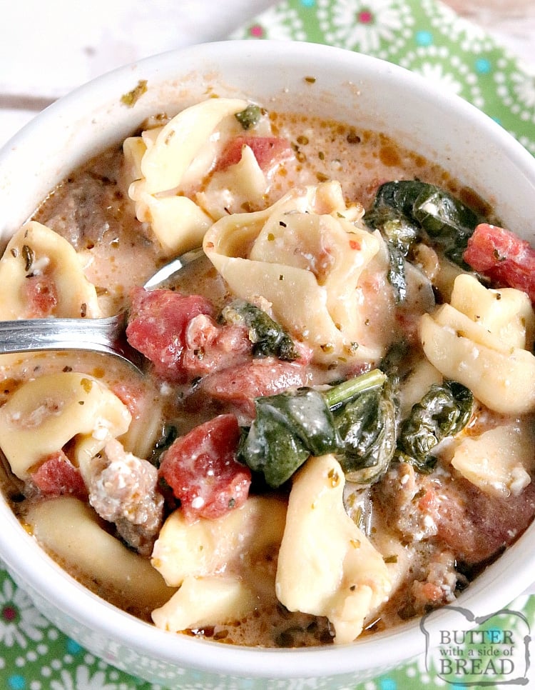 Crockpot Sausage Tortellini Soup made with Italian sausage, tortellini, fresh spinach, canned tomatoes in a flavorful creamy broth. This crockpot soup recipe only takes a few minutes of prep and then the slow cooker does the rest of the work!