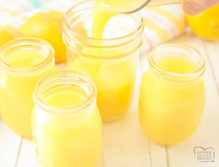 putting homemade lemon curd in glass jars