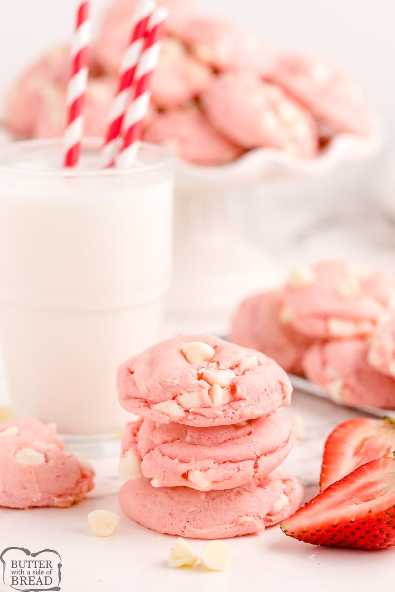 stack of strawberry cake mix cookies with milk