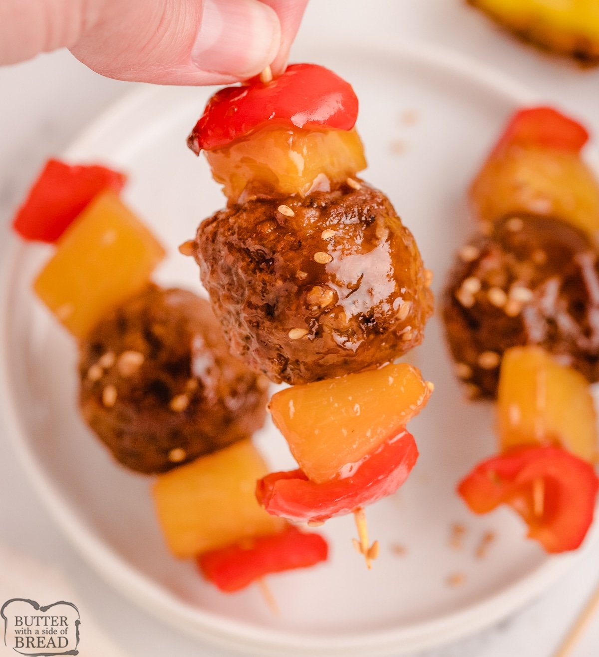 pineapple teriyaki meatballs on skewers served as kabobs