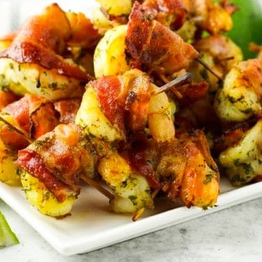Bacon Wrapped Shrimp is a simple appetizer that only takes 6 ingredients & minutes to cook. This bacon wrapped shrimp recipe is a delicious combination of tangy lime & savory shrimp and bacon.