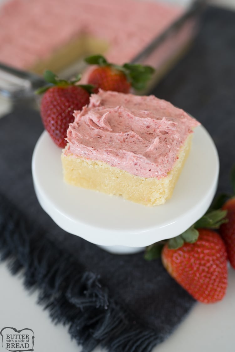 sugar cookie bars with strawberry frosting