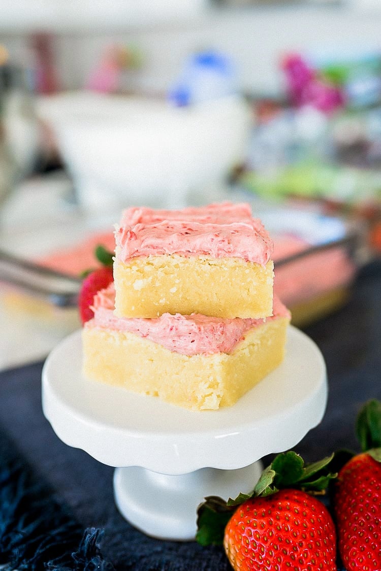 Sugar Cookie Bars with Strawberry Frosting is the perfect spring-time dessert! The fruity frosting is the perfect way to level up your dessert!