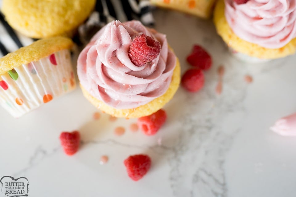 raspberry frosting, piped onto a cupcake