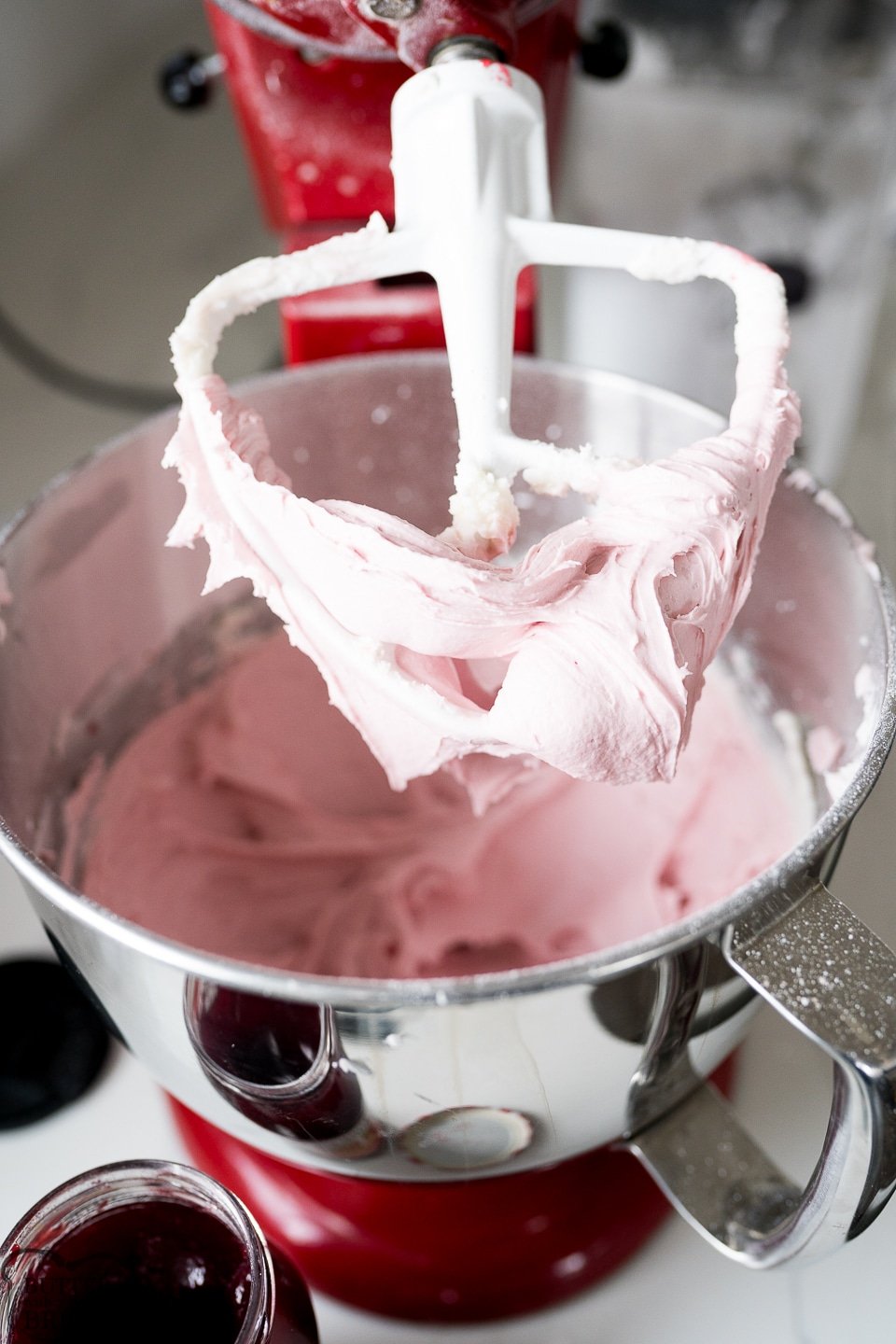 raspberry buttercream frosting in a stand mixer