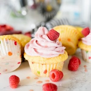 lemon cupcake with raspberry frosting