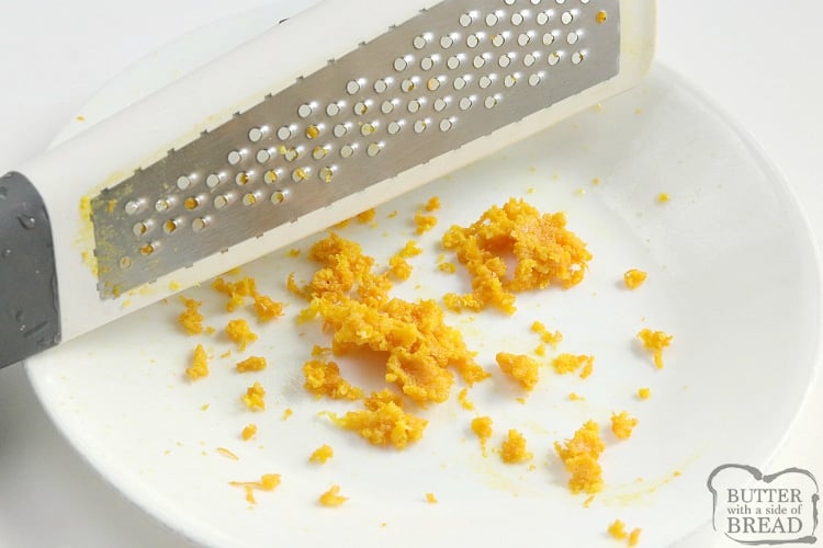 Zesting an orange with a grater