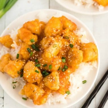 Homemade Orange Chicken made with a sweet & savory orange sauce and tender breaded chicken. This orange chicken recipe with orange marmalade is simple and perfect alongside white rice!