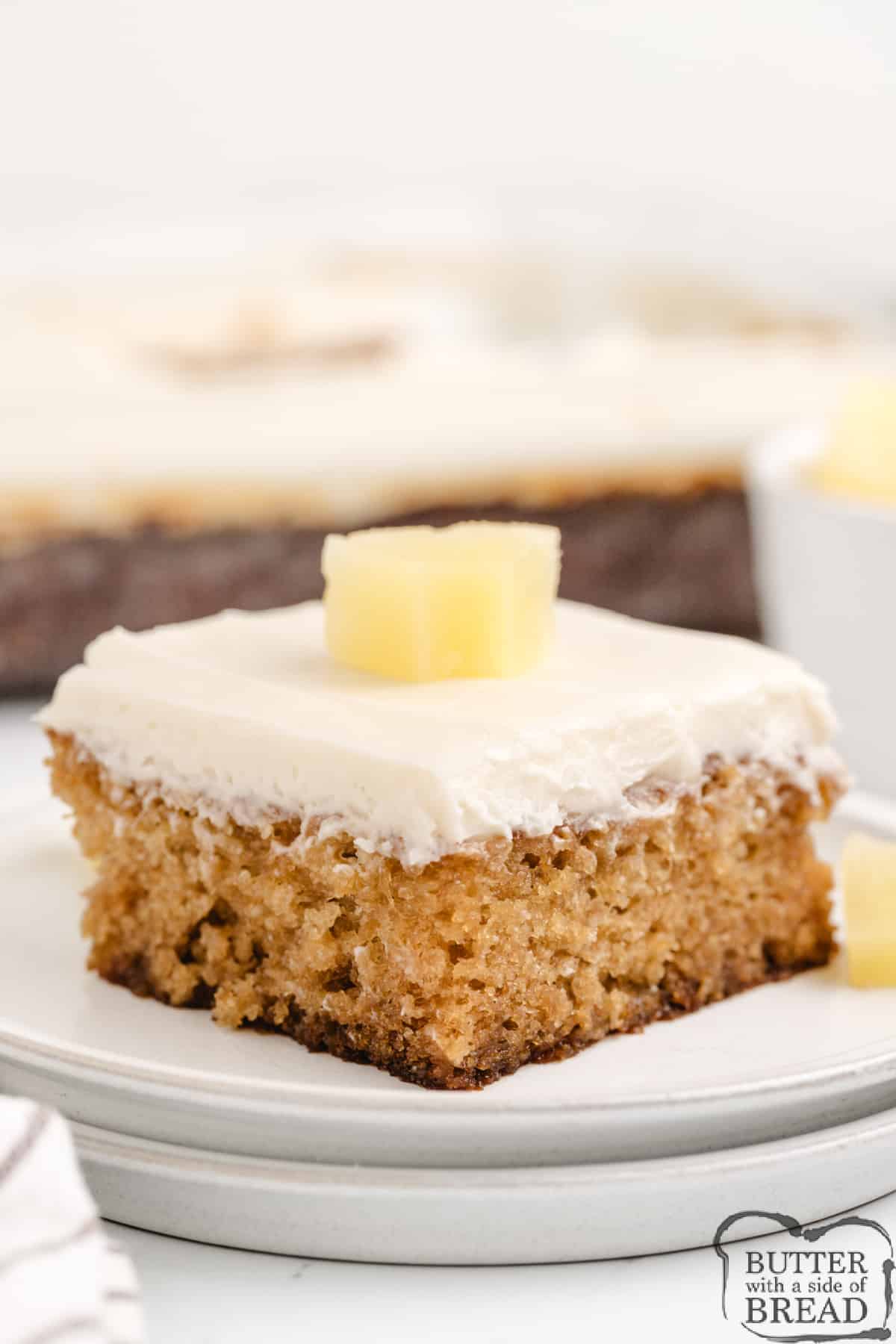 Easy Pineapple Cake made with crushed pineapple, then topped with a simple cream cheese frosting. This easy cake recipe is perfectly moist and full of flavor!