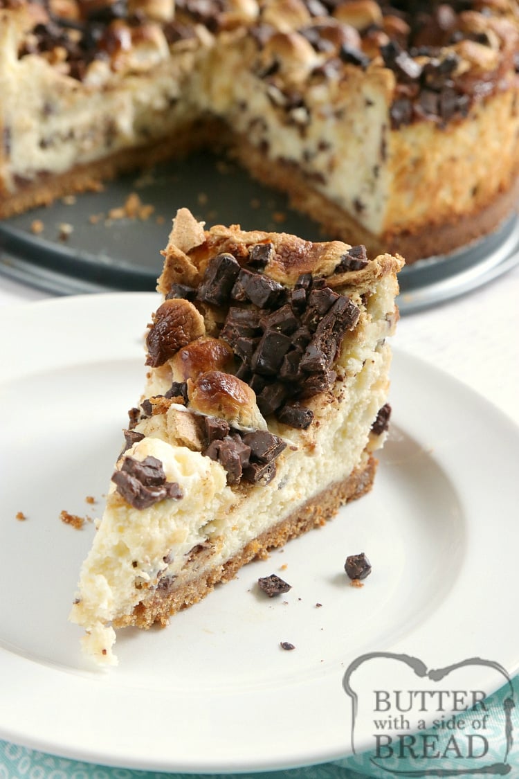 S'mores Cheesecake is a rich homemade cheesecake that is topped with chopped Hershey bars, graham cracker pieces and mini marshmallows. Making cheesecake from scratch has never been so decadent!
