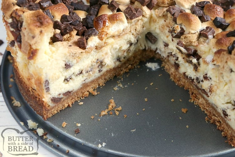S'mores Cheesecake is a rich homemade cheesecake that is topped with chopped Hershey bars, graham cracker pieces and mini marshmallows. Making cheesecake from scratch has never been so decadent!