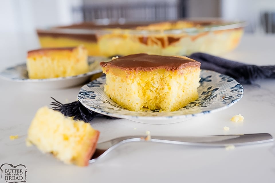 Boston Cream Pie Poke Cake is a yellow cake, poked & filled with vanilla pudding then topped with smooth chocolate ganache. This poke cake recipe mimics Boston Cream Pie, only it's more quick & easy to make!