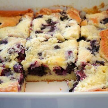 blueberry cake in a white baking dish