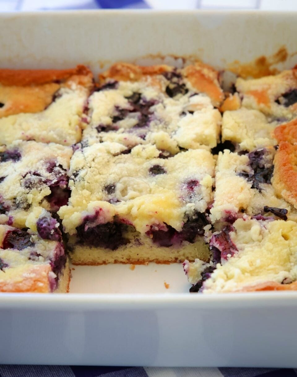 blueberry cake in a white baking dish