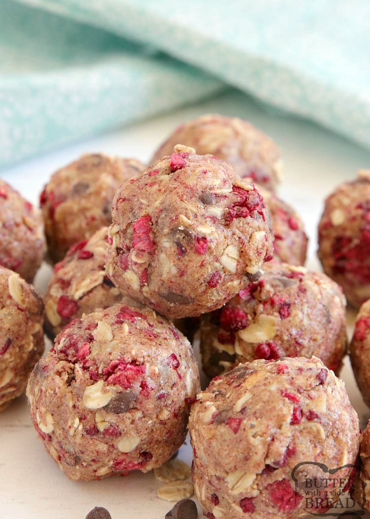 Chocolate Raspberry Protein Balls are simple, delicious, full of protein and can be made in just a few minutes! Made with protein powder, almond butter and freeze-dried raspberries for a high-protein snack.