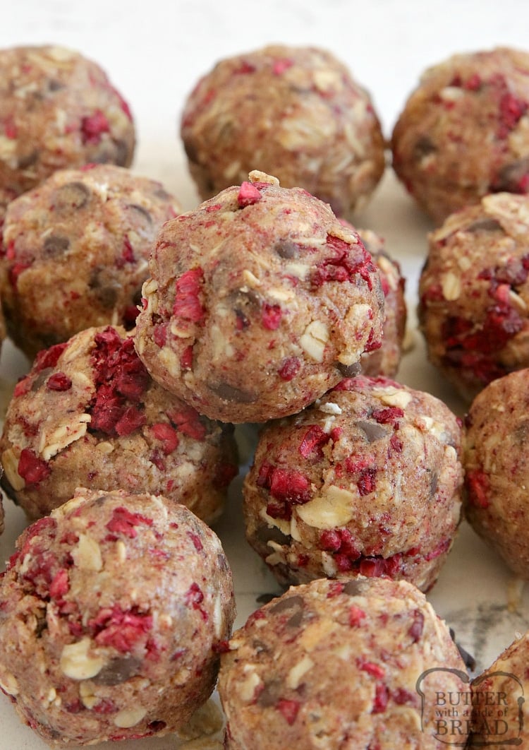 Chocolate Raspberry Protein Balls are simple, delicious, full of protein and can be made in just a few minutes! Made with protein powder, almond butter and freeze-dried raspberries for a high-protein snack.
