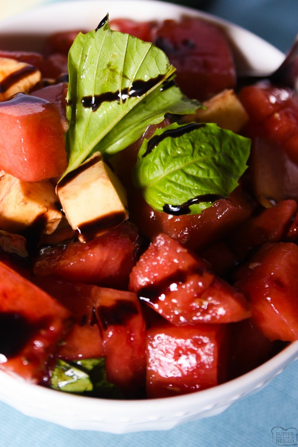 Watermelon Salad recipe with just 4 ingredients! Delightful mix of sweet and savory flavors in this watermelon salad with basil and balsamic vinegar! 