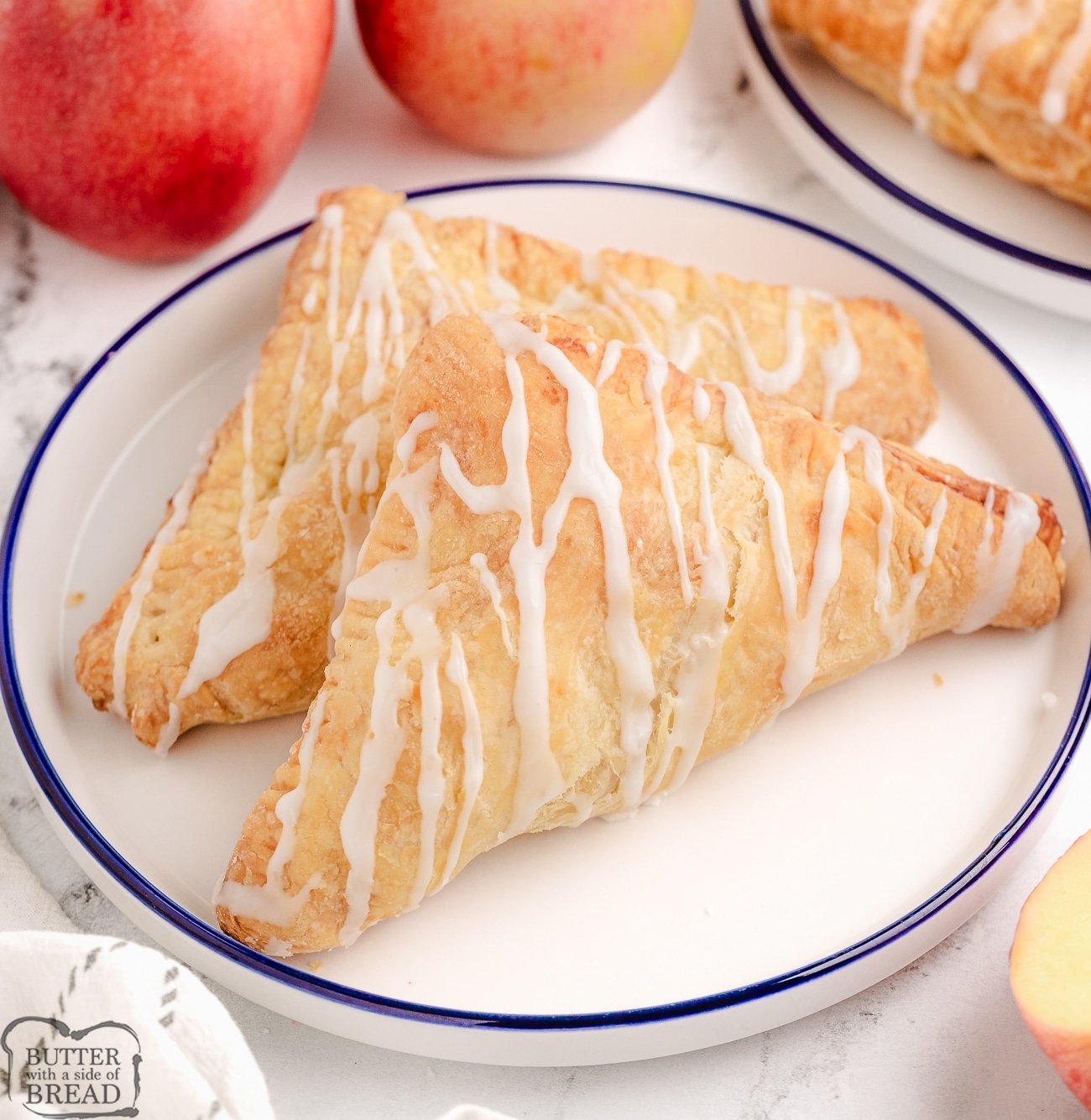puff pastry apple turnovers on a plate