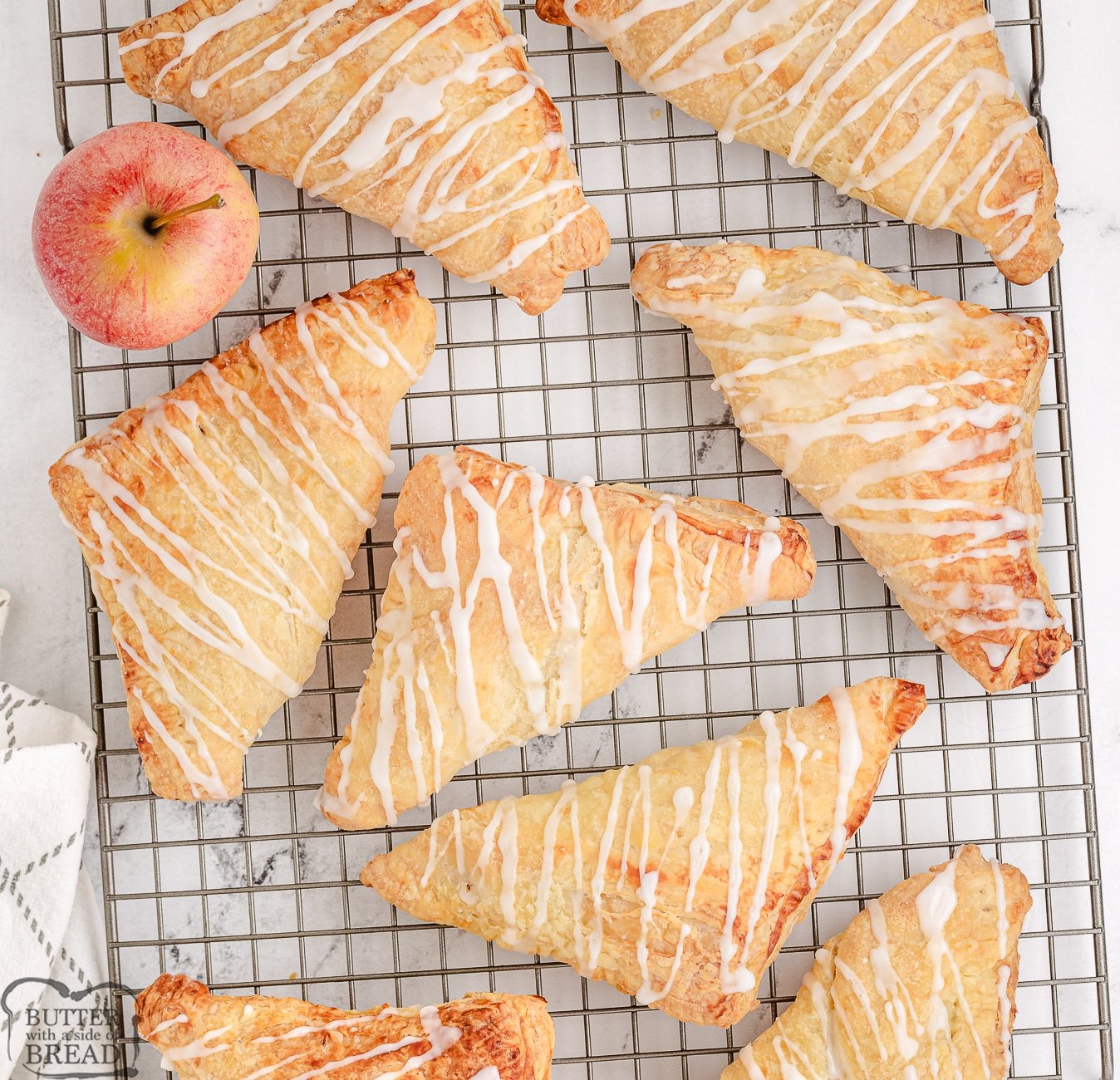 easy apple turnovers on a cooling rack