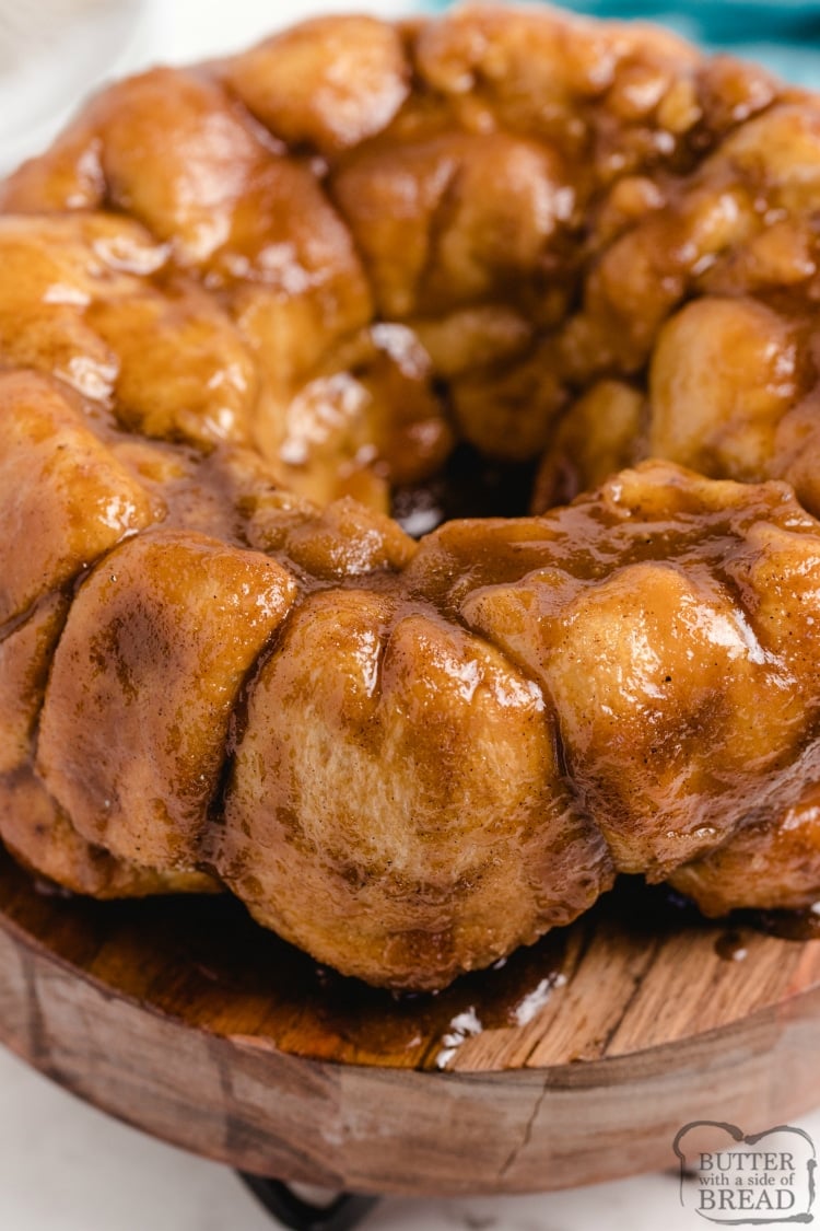 Cream Cheese Stuffed Monkey Bread are warm, gooey cinnamon rolls made with frozen rolls that are filled with cream cheese and coated in brown sugar, butter and cinnamon sugar. Only 5 ingredients to make delicious cinnamon roll monkey bread! 