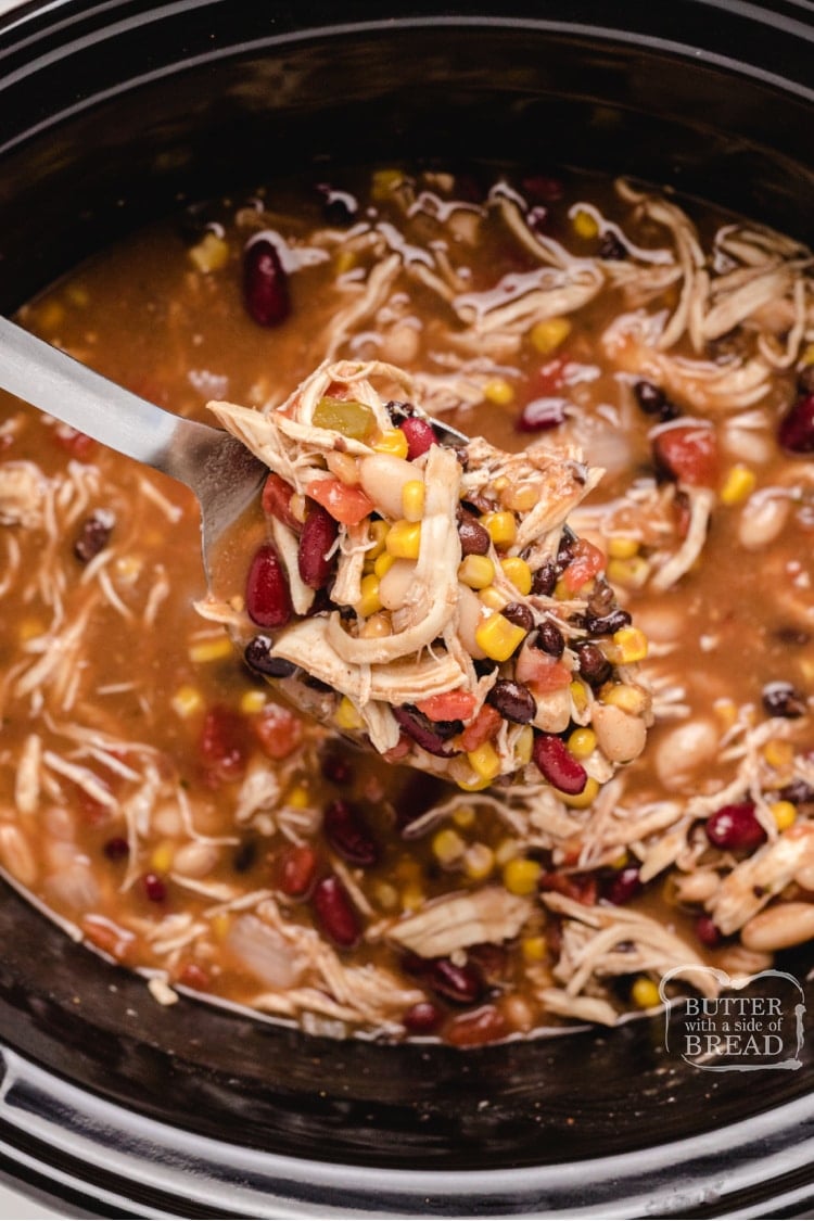 Crockpot Chicken Taco Soup packed with chicken, beans, tomatoes and tons of flavor! Easy "dump and go" slow cooker chicken taco soup recipe with less than 5 minutes of prep time! 