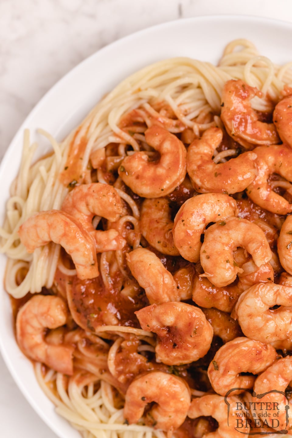 Fresh shrimp in a buttery scampi sauce over pasta