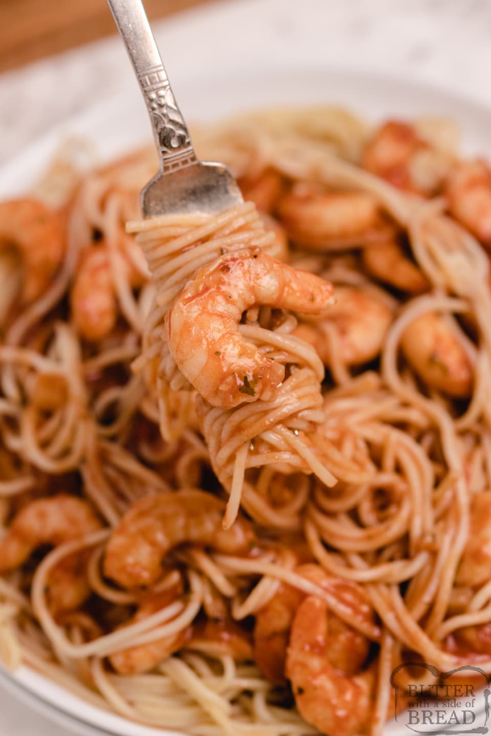 Spicy Shrimp Scampi is buttery, full of flavor and tastes delicious over angel hair pasta. This buttery scampi sauce with shrimp is simple, impressive and only takes a few minutes to prep.