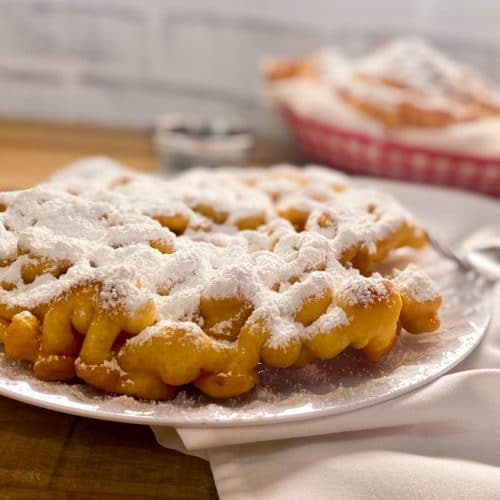 The Ideal Temperature For Frying Funnel Cake, And How To Tell It's Ready