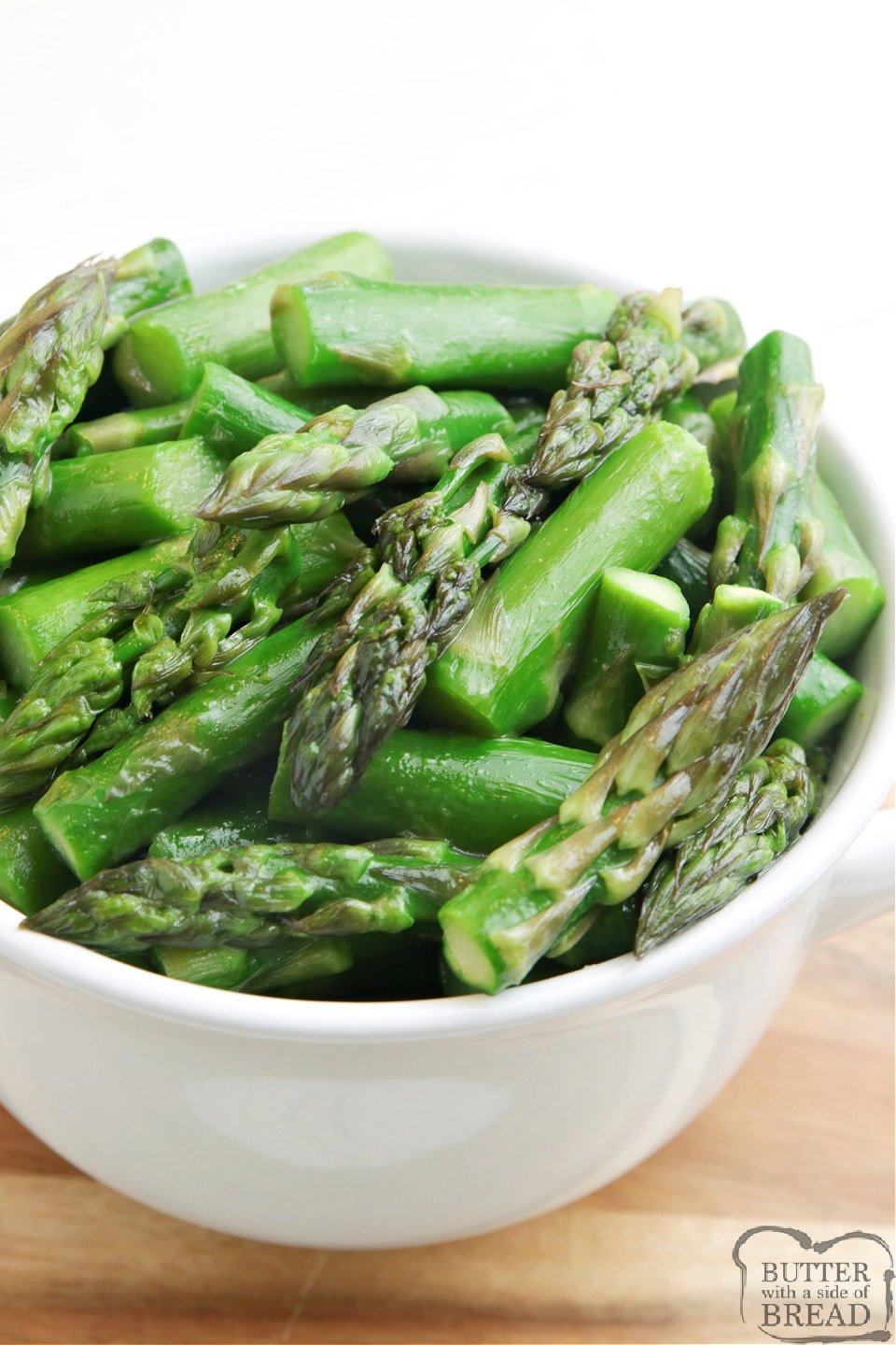 Sugared Asparagus recipe made with brown sugar, butter and chicken broth. Perfect balance of sweet and savory for a simple asparagus recipe that is made on the stove in just a few minutes.