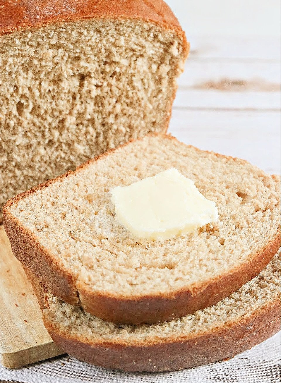 Large Batch Wheat Bread recipe that makes 4 loaves of perfect honey wheat bread every single time. I love homemade bread and this recipe is the most foolproof (and delicious) wheat bread recipe that I've ever tried. 