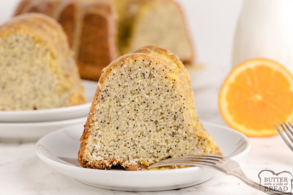 Poppy Seed Bundt Cake made from scratch with a delicious orange flavored glaze. Perfect cake recipe for breakfast, dessert or even a snack! 