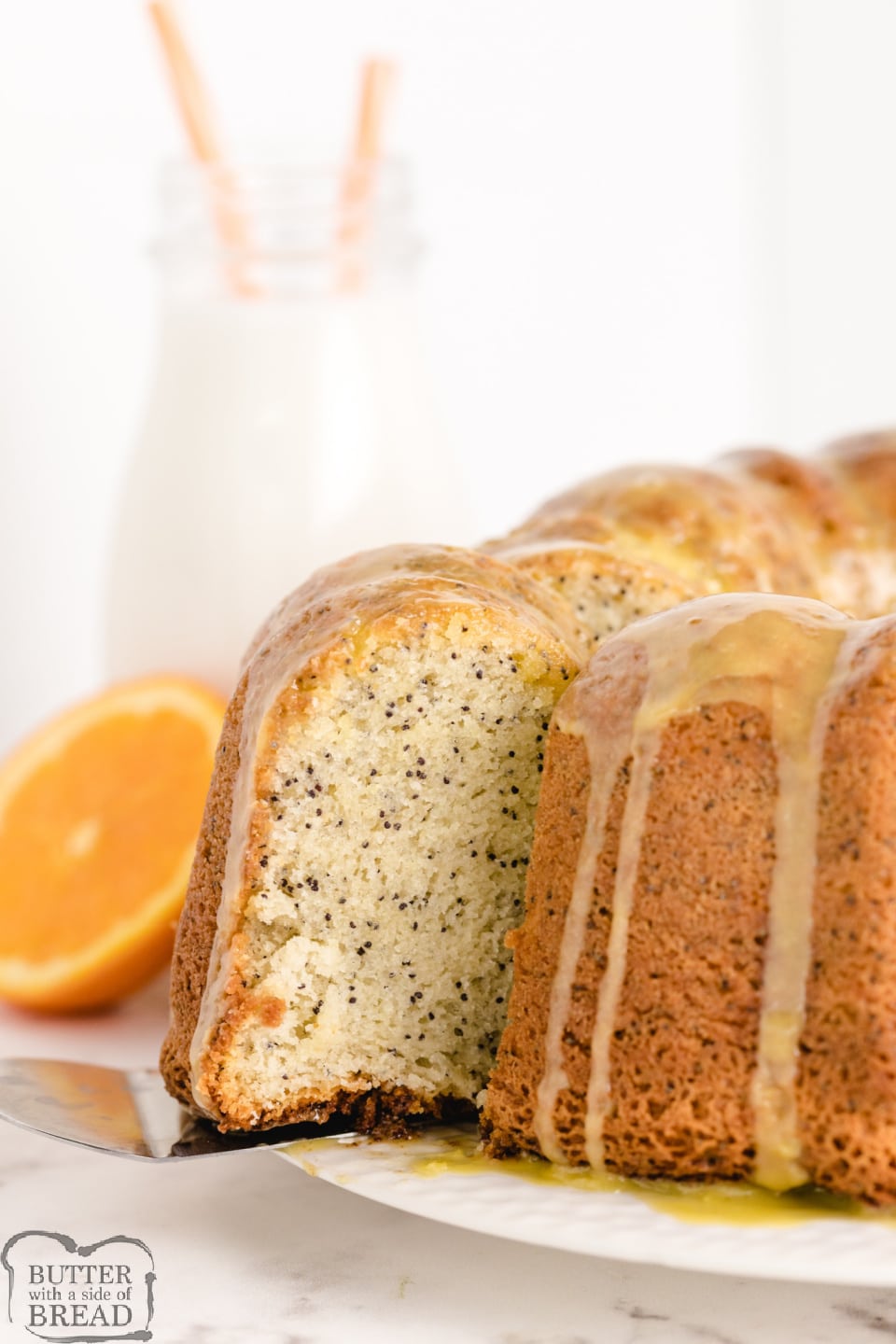 Poppy Seed Bundt Cake made from scratch with a delicious orange flavored glaze. Perfect cake recipe for breakfast, dessert or even a snack! 