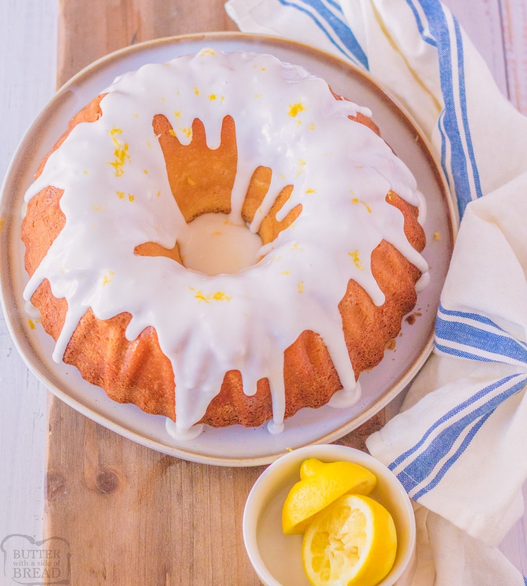 pound cake with icing  and lemons on the side