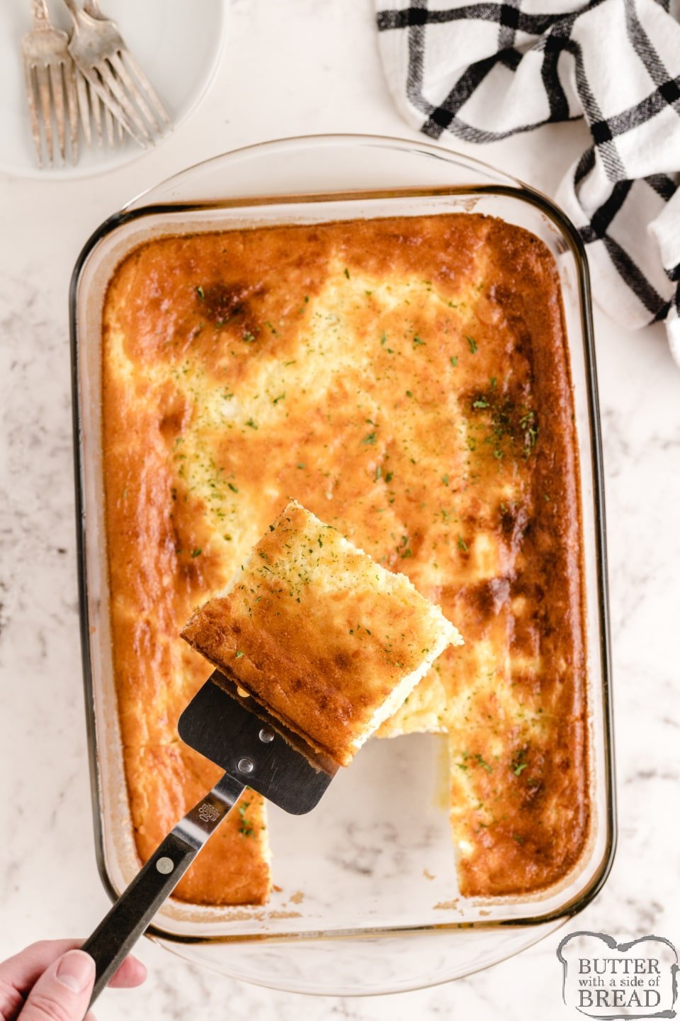 Cheesy Baked Egg Casserole made with eggs, milk and three different kinds of cheese. Perfect baked breakfast casserole recipe with tons of protein!