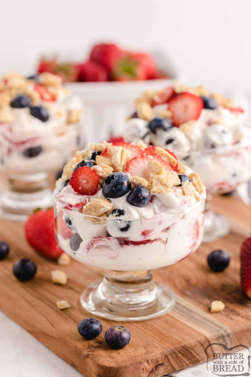 Lemon Berry Yogurt Parfaits made with sweetened whipped cream, yogurt and lots of fresh berries. Simple no-bake dessert or snack that is light and delicious!
