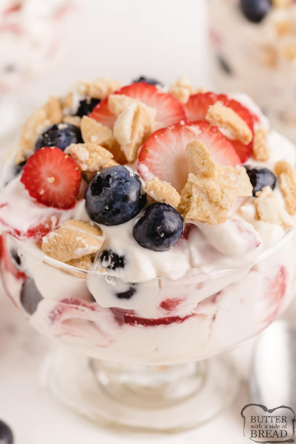 Lemon Berry Yogurt Parfaits made with sweetened whipped cream, yogurt and lots of fresh berries. Simple no-bake dessert or snack that is light and delicious!