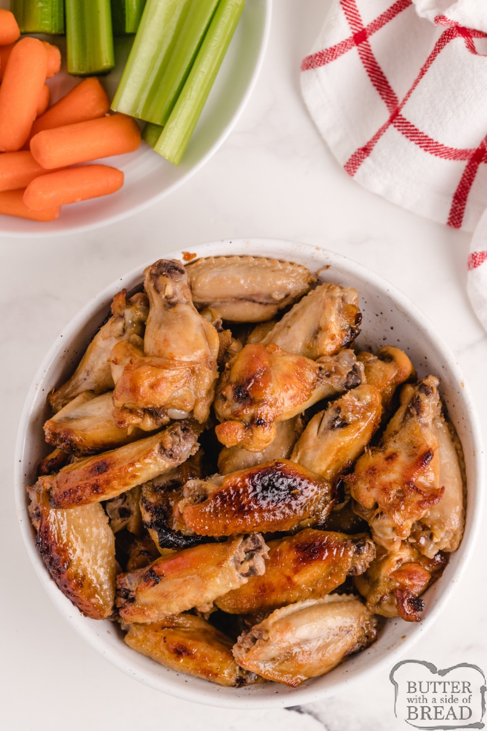 Oven Baked Chicken Wings are perfect for an appetizer, side dish or even the main course. These baked chicken wings are marinated overnight so they are tender, juicy and packed with flavor!