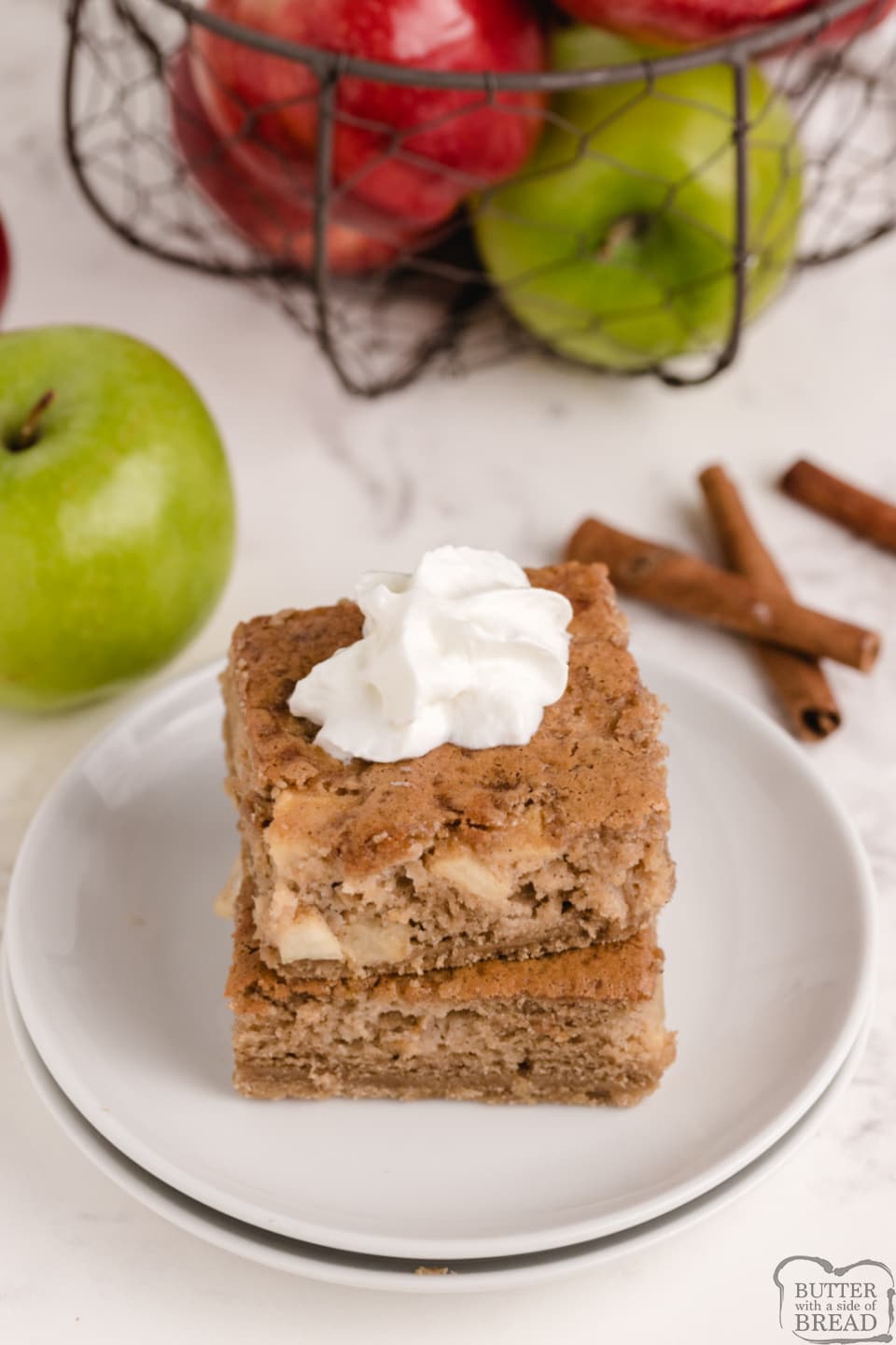 Sour Cream Apple Pie Bars are almost like a pie, almost like a cookie, but absolutely delicious! Made with fresh apples, sour cream and a few other basic ingredients, this just might be your new favorite apple dessert! 