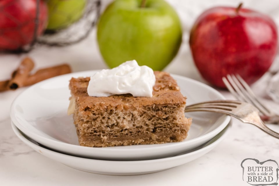 Sour Cream Apple Pie Bars with whipped cream on top