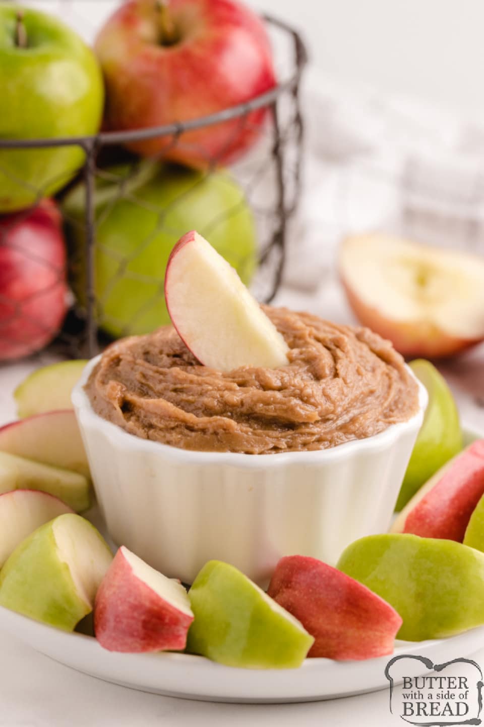 Peanut Butter Apple Dip is made with 5 simple ingredients and is perfect for a snack. Made with cream cheese, peanut butter, and brown sugar in less than 3 minutes!