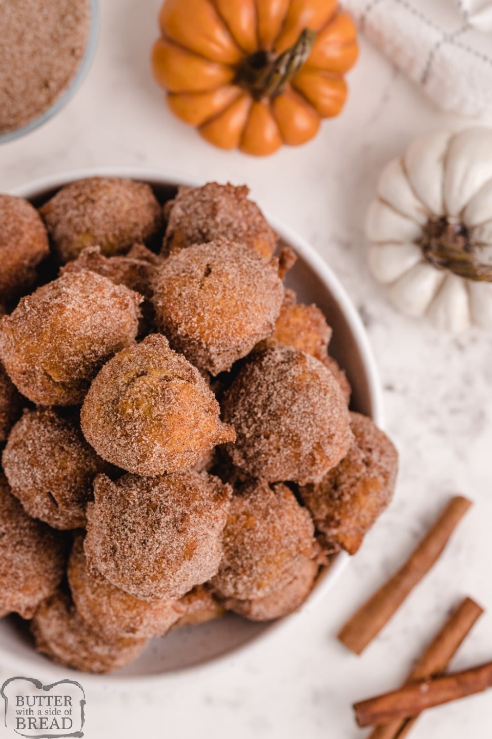 Pumpkin Donut Holes coated in cinnamon and sugar