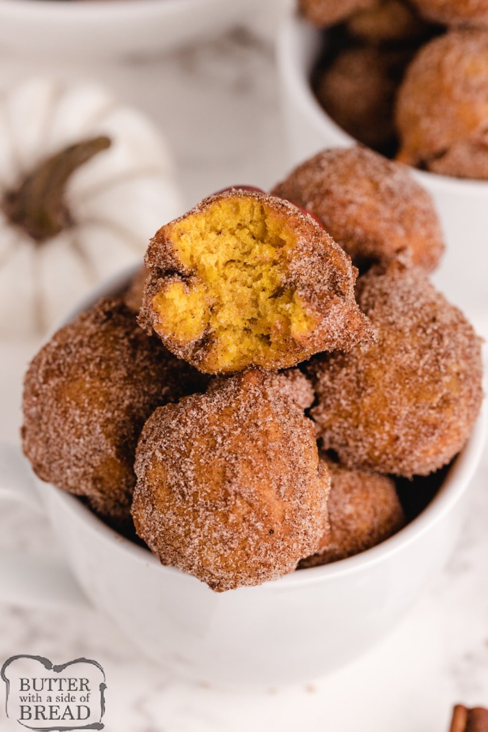 Pumpkin Donut Holes are soft, delicious and easy to make - no yeast necessary! Coated in cinnamon and sugar, and packed with pumpkin, this donut hole recipe is perfect for fall!
