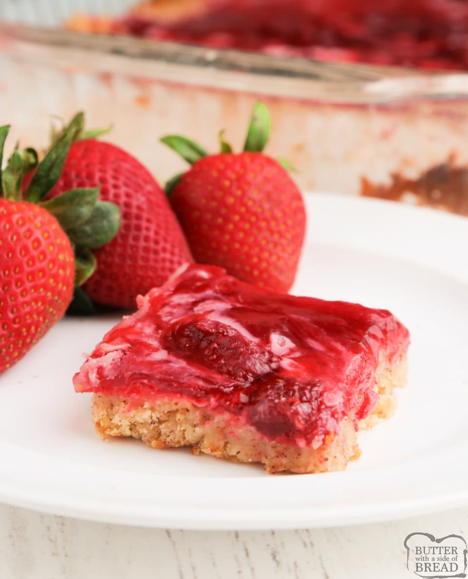 Strawberry Banana Bars made with a banana bread or muffin mix, strawberry pie filling and just three other basic ingredients. Easy banana recipe that is perfect for a snack or dessert! 